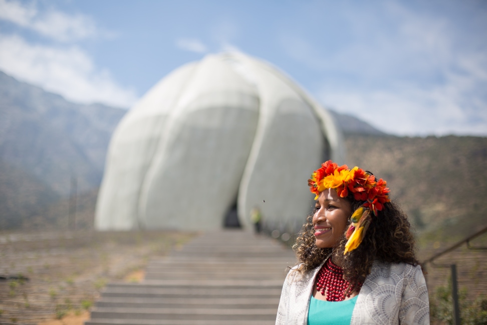 Woman standing in front of the Continental Bahá’í House of Worship of South America (Santiago, Chile)