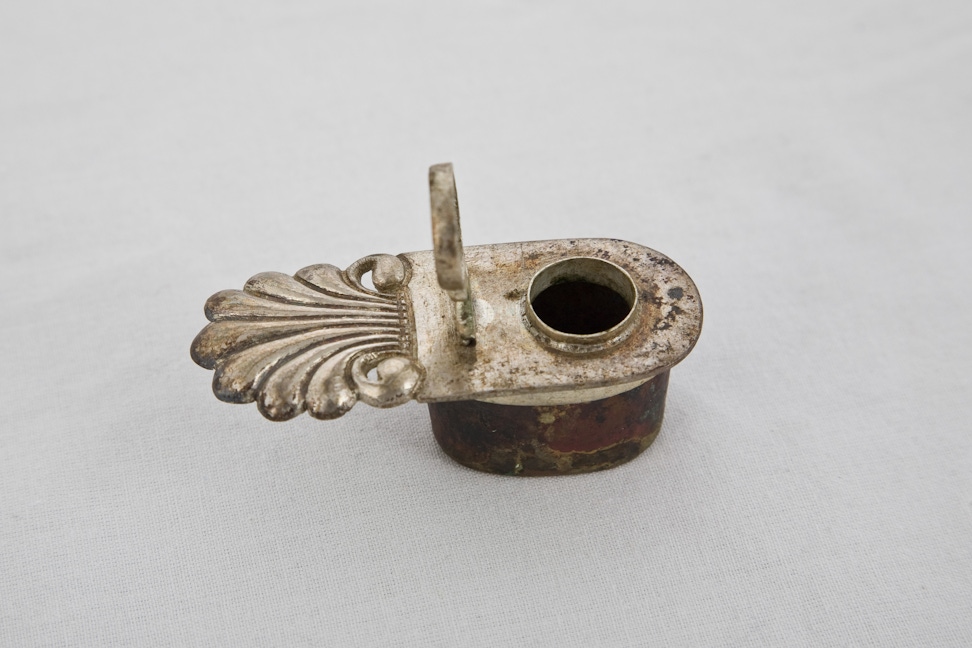 Copper inkwell with silver decorative top belonging to Bahá’u’lláh