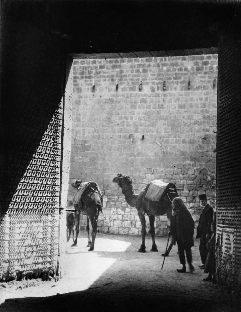 The land gate of 'Akka from inside the city. Bahá’u’lláh left through this gate. c. 1921