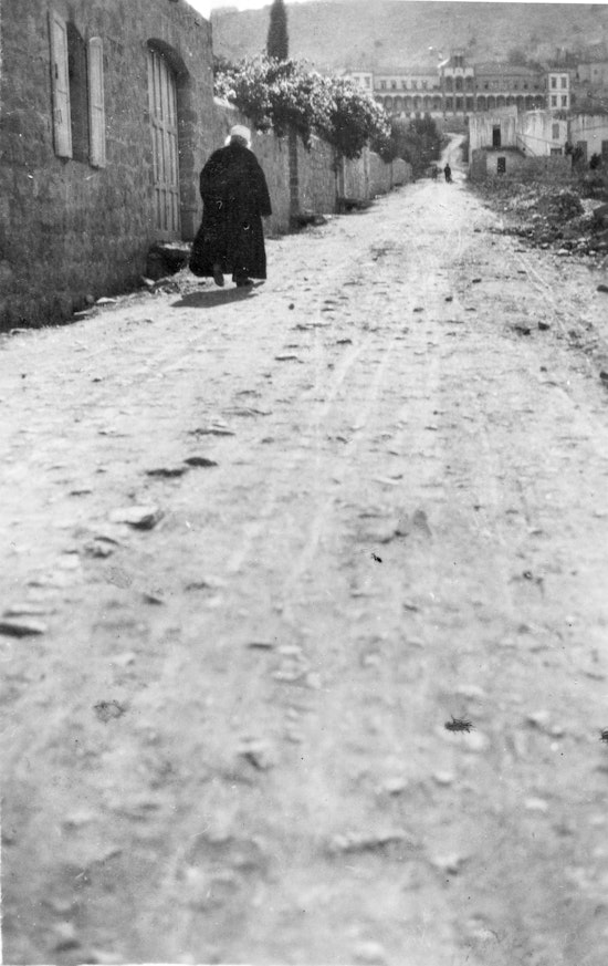 ‘Abdu’l-Bahá walking up Haparsim Street, c. 1920