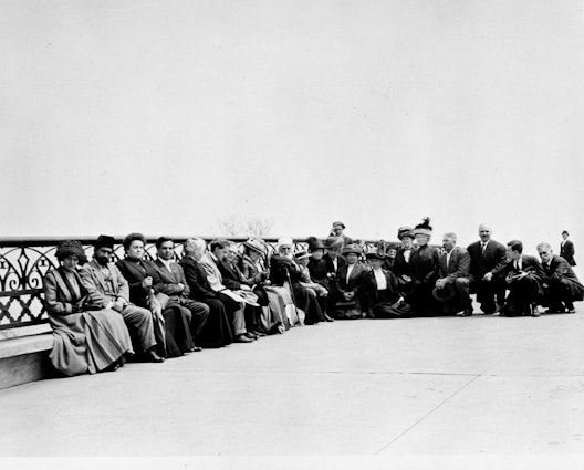 ‘Abdu’l-Bahá sitting with a group of friends at Lincoln Park, Chicago, Illinois, 3 May 1912