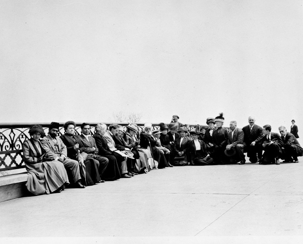 ‘Abdu’l-Bahá sitting with a group of friends at Lincoln Park, Chicago, Illinois, 3 May 1912
