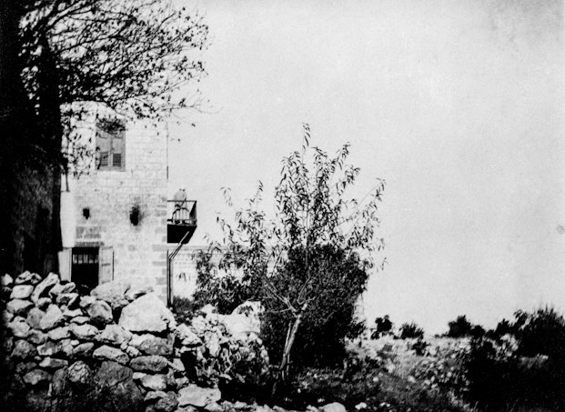 ‘Abdu’l-Bahá standing on the balcony of the house of Abbas Gholi, c. 1920