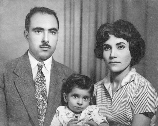 Knight of Bahá’u’lláh for Socotra Island, Mirza Aqa Khan Kamali Sarvistani with his wife, Rezwanieh and son, Alla’u’din