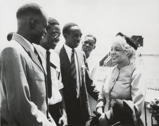 Elsie Austin (right) and Enoch Olinga (second from left) at the International Teaching Conference, Kampala, Uganda, February 1953