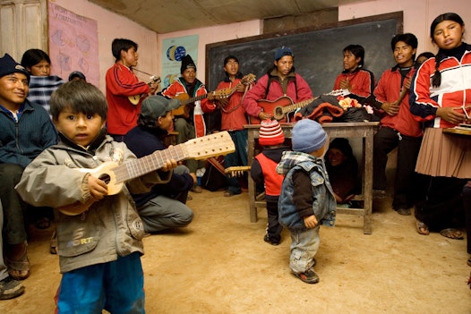 Bahá’ís gather for a nineteen day feast at the Baha'i Centre in Puka Puka, Bolivia