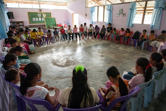 Children gathering for prayers after their Children's Classes at the Baha'i Centre in Kampung Selampit in Sarawak, Malaysia