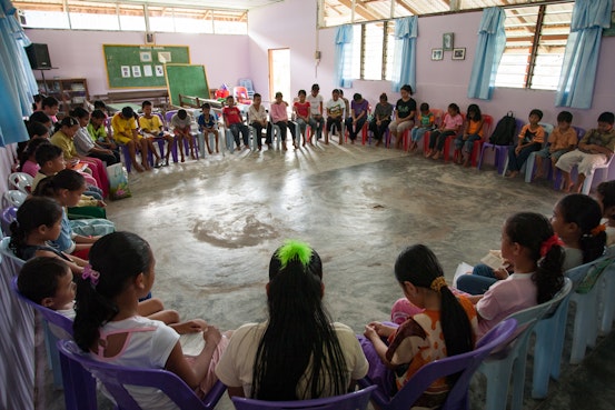 Children gathering for prayers after their Children's Classes at the Bahá’í Centre in Kampung Selampit in Sarawak, Malaysia