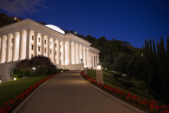 The Seat of the Universal House of Justice at night 
