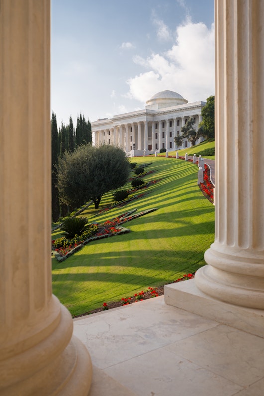 The Seat of the Universal House of Justice viewed from the colonnade of the International Archives Building 
