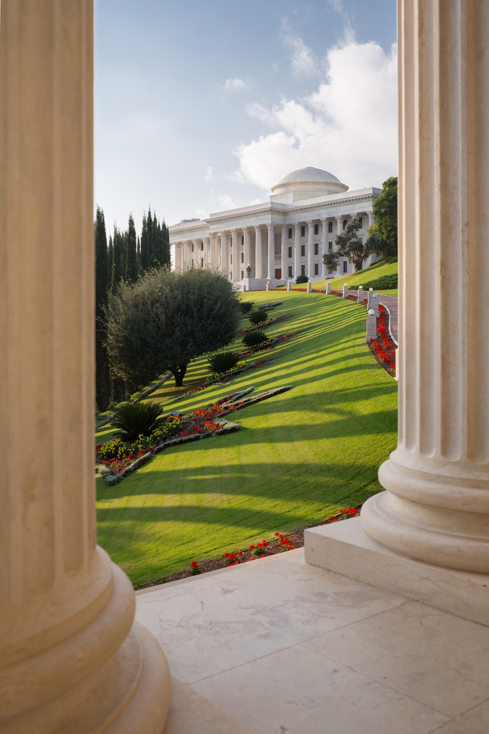 The Seat of the Universal House of Justice viewed from the colonnade of the International Archives Building 