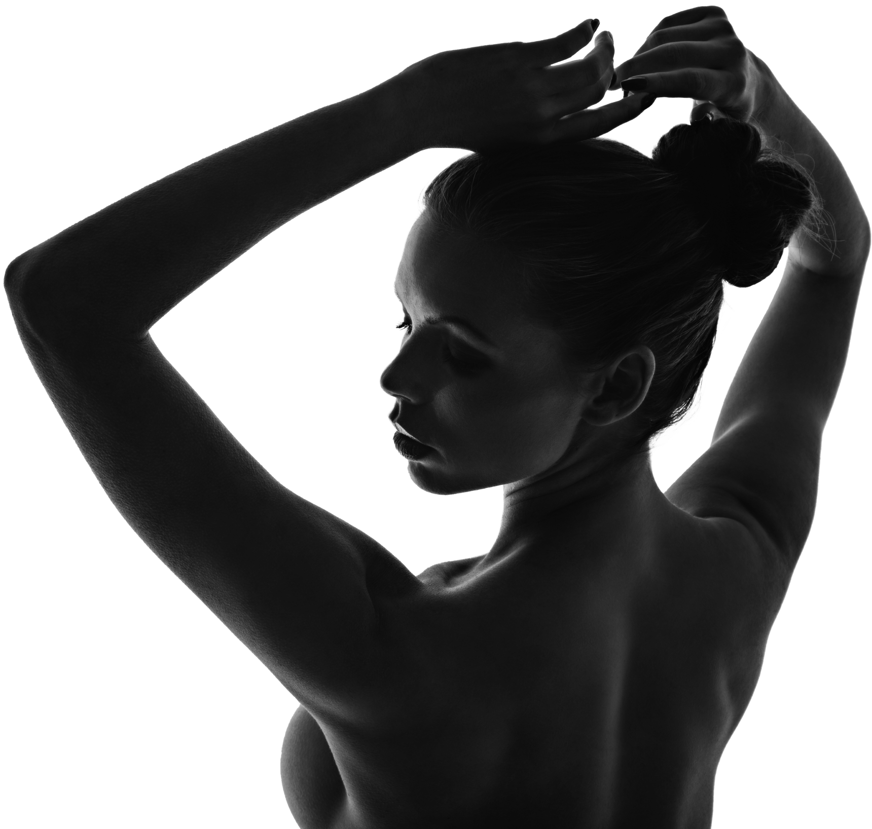 Silhouette of a topless woman.