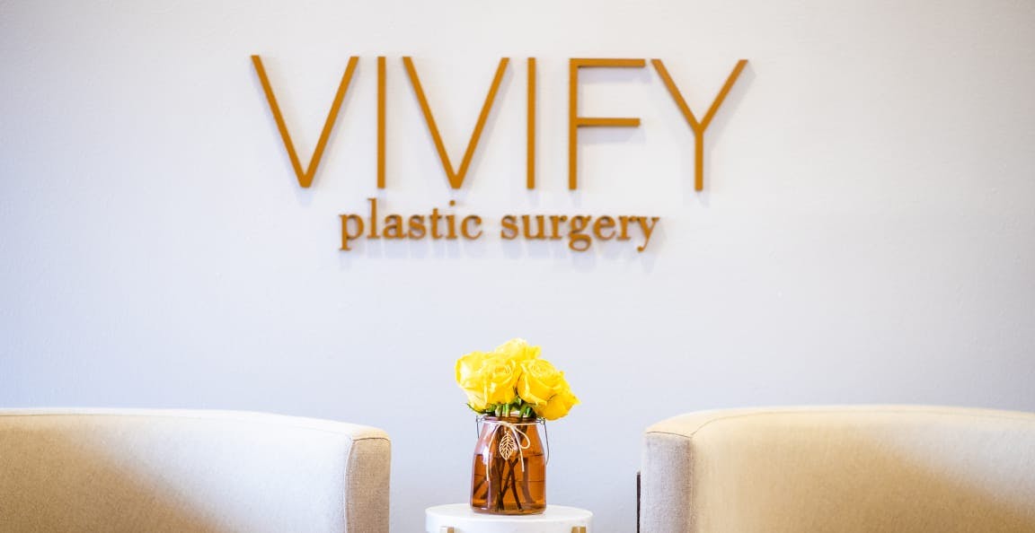 Vivify Plastic Surgery signage in the office.