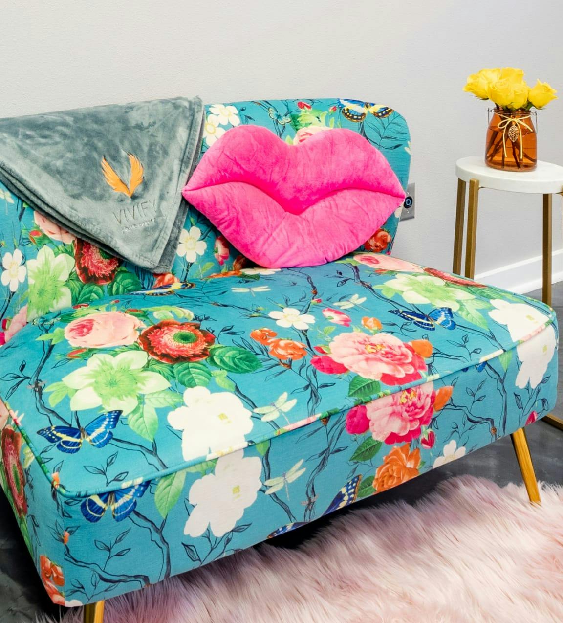 Colorful furniture in the waiting area at Vivify MedSpa.