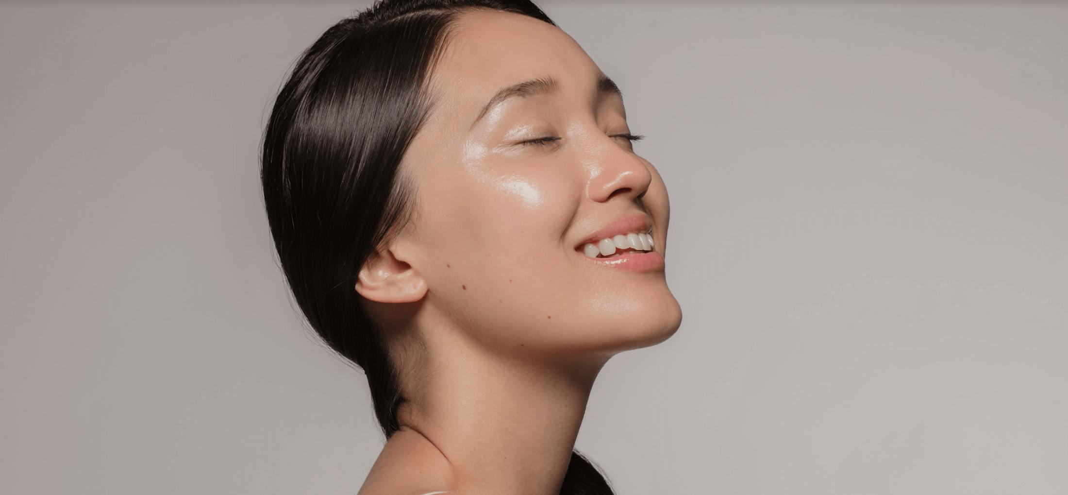 Woman's Profile Smiling with her Eyes Closed