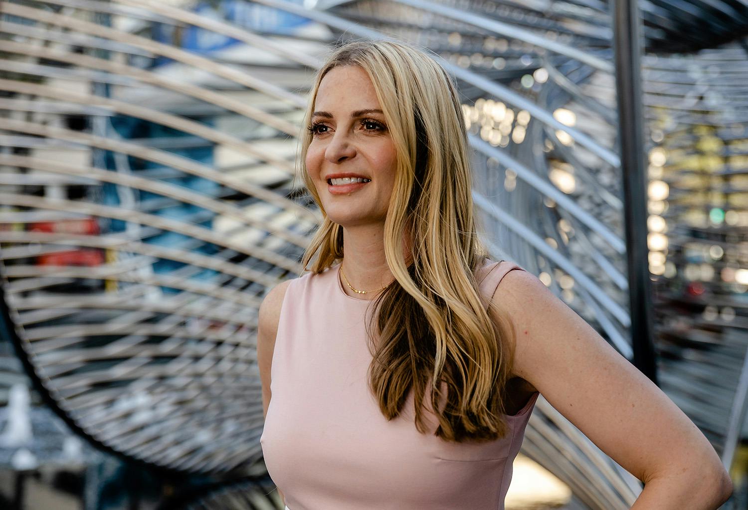 Michelle Buchanan with Abstract Structure Behind Her