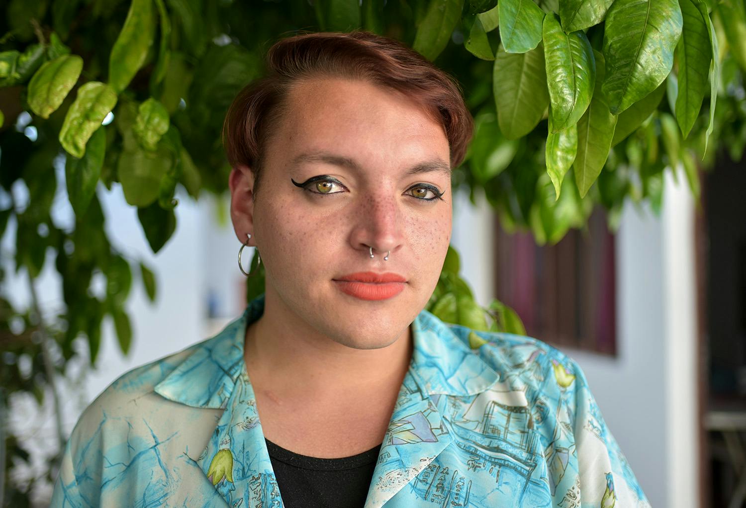 Gender Fluid Person Wearing Eyeliner and Lipstick