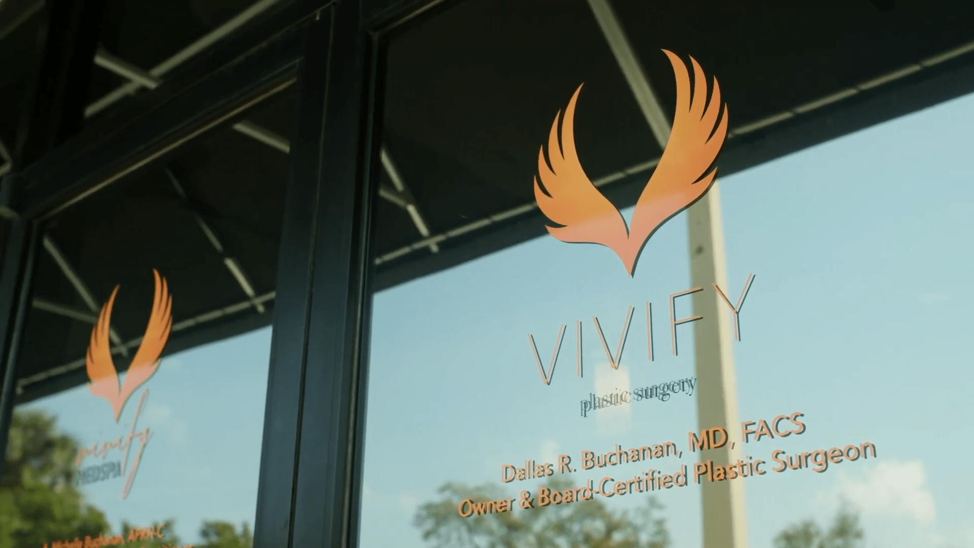 Vivify Logo on a Sliding Glass Door