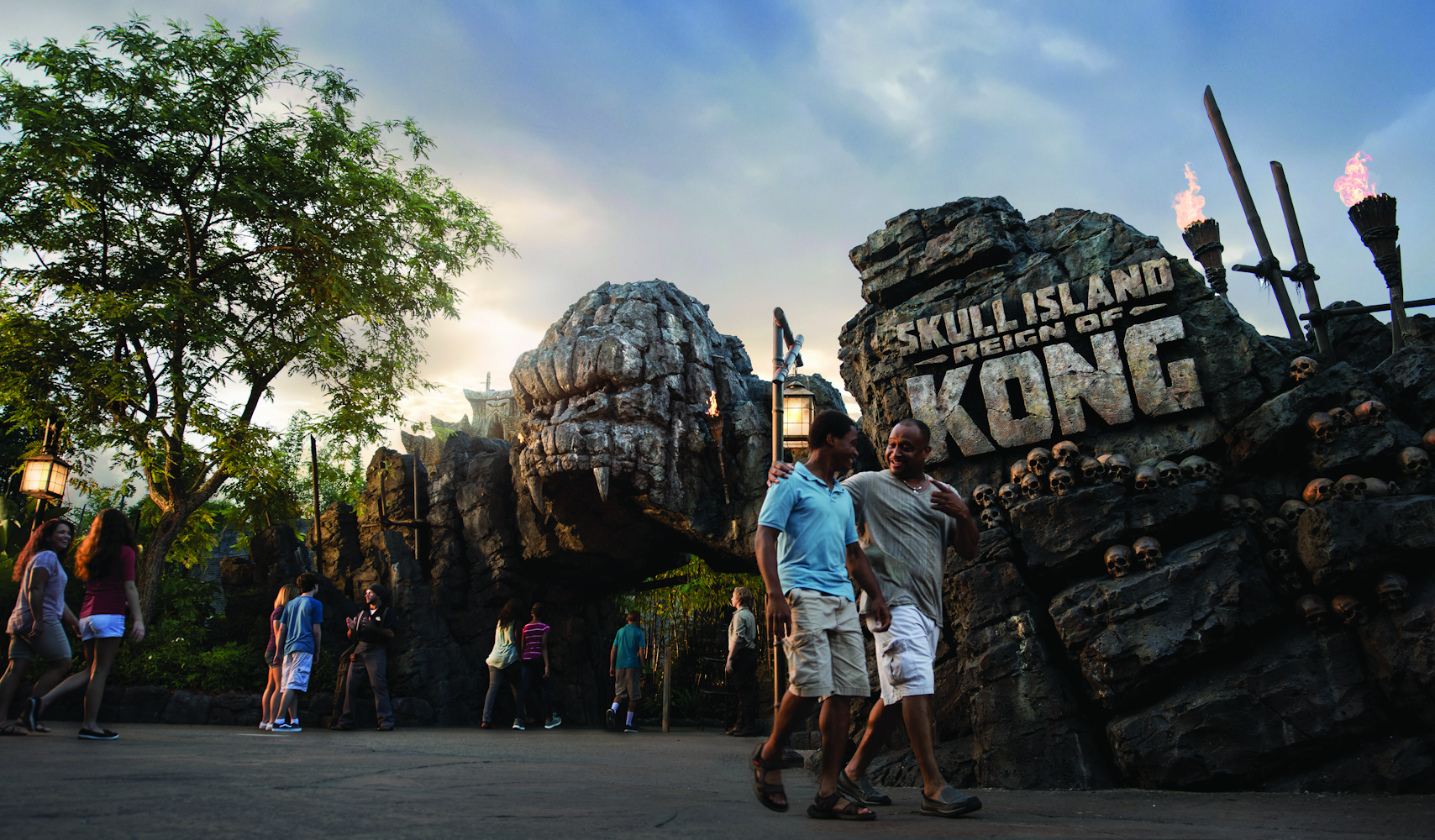 Guests Walking in Front of Skull Islands Reign of Kong Entrance