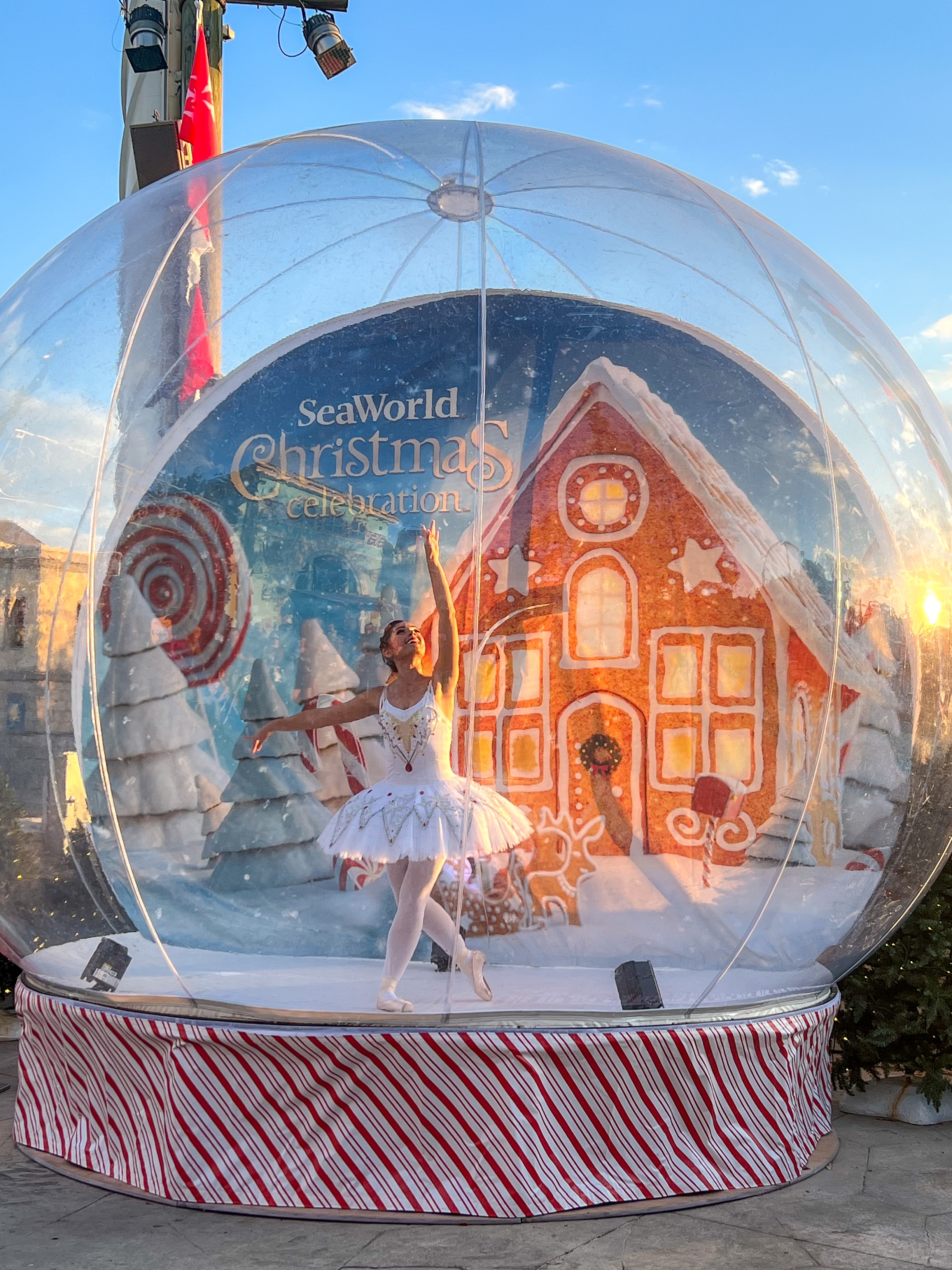 Ballerina performing inside a giant snowglobe at SeaWorld Orlando