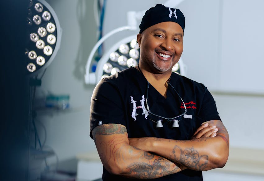 Dr. Leonel Hunt with his scrubs and cap on