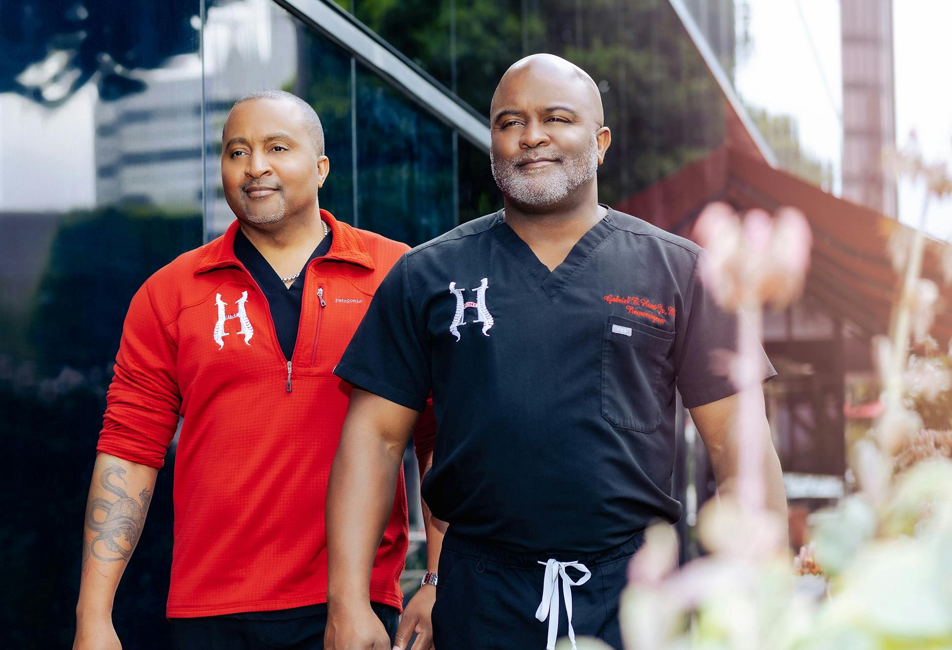 Hunt brothers walking down the street in their office garb