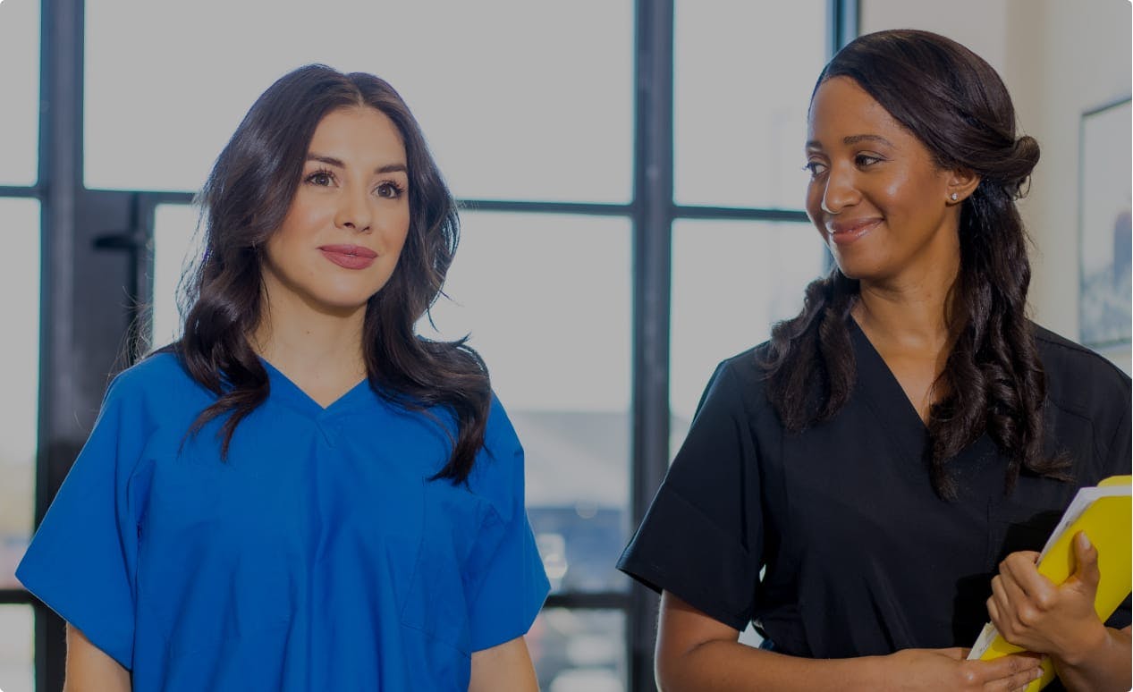 Employee walking with a patient at Longhorn Imaging