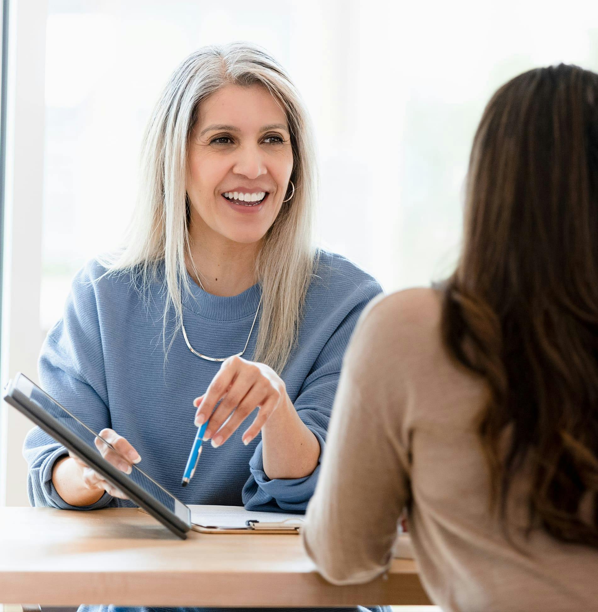 Two woman reviewing imaging test results