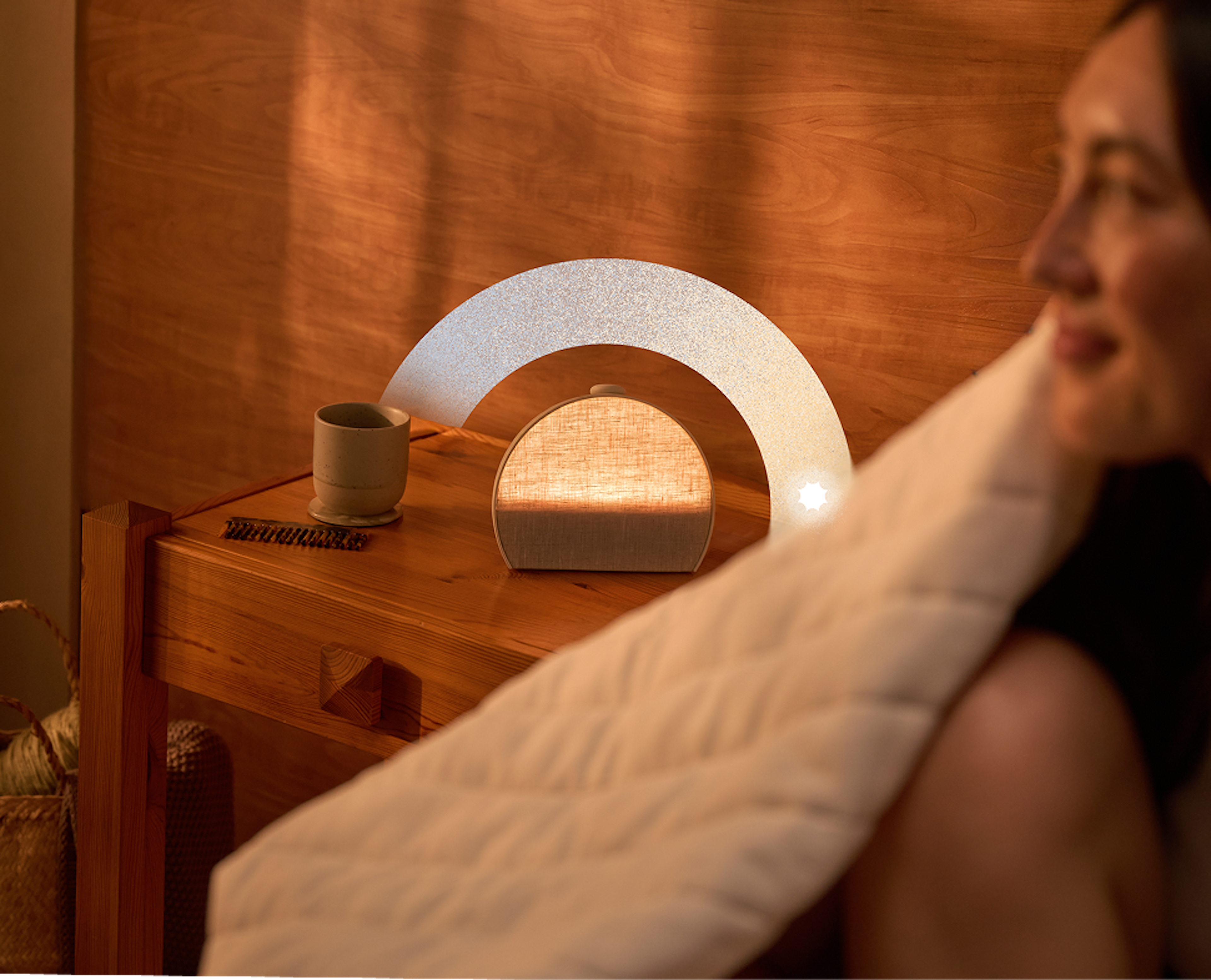 Person stretching in the morning sunlight