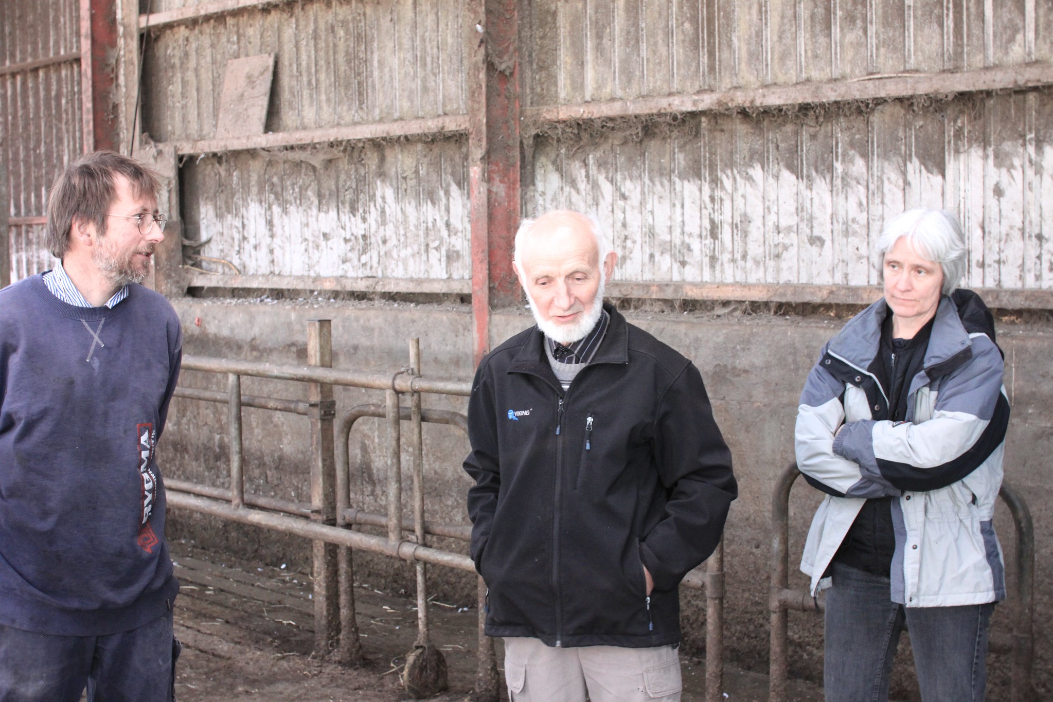 Farmer Hans Peter Kampp, a neighbouring co-farmer and his wife