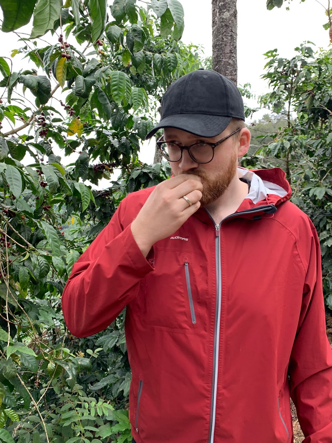 Jānis tasting a coffee cherry for the first time