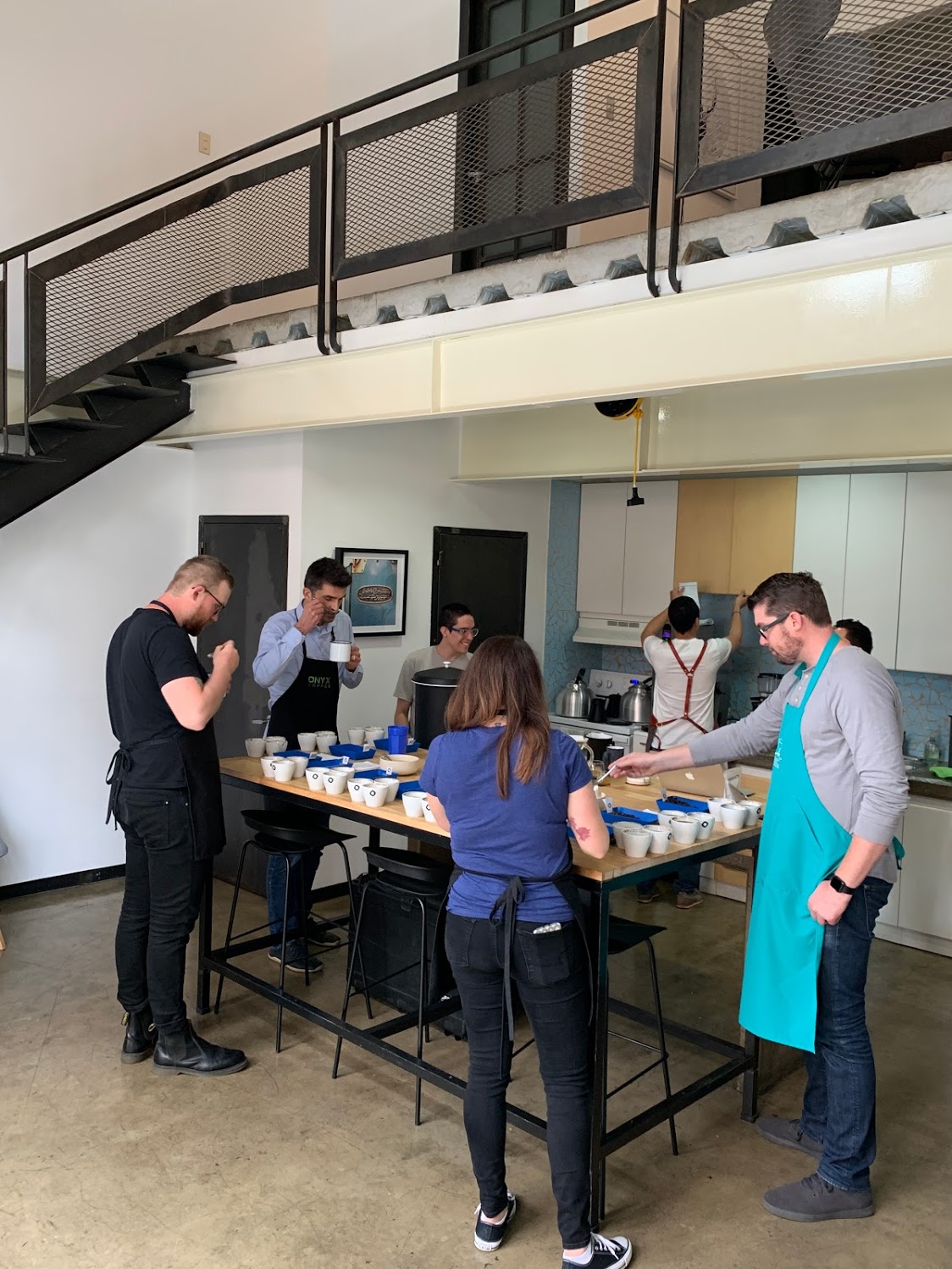 Cupping coffee in their cupping lab