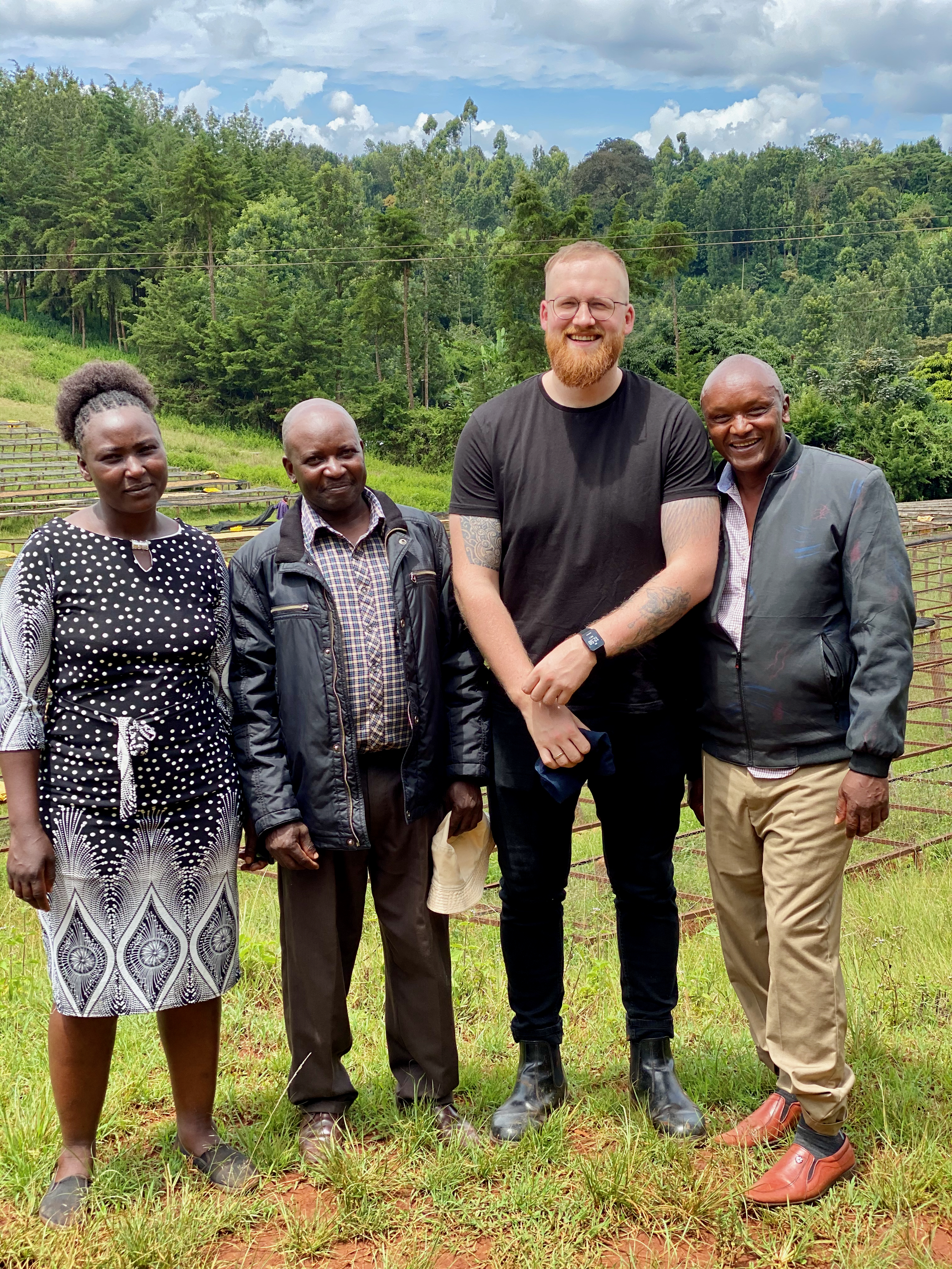 Godthåbsvej bar manager Janis Podins with Jane Wambui, Charles Gathaiya Murimi and Josphat Muriuki of Kieni