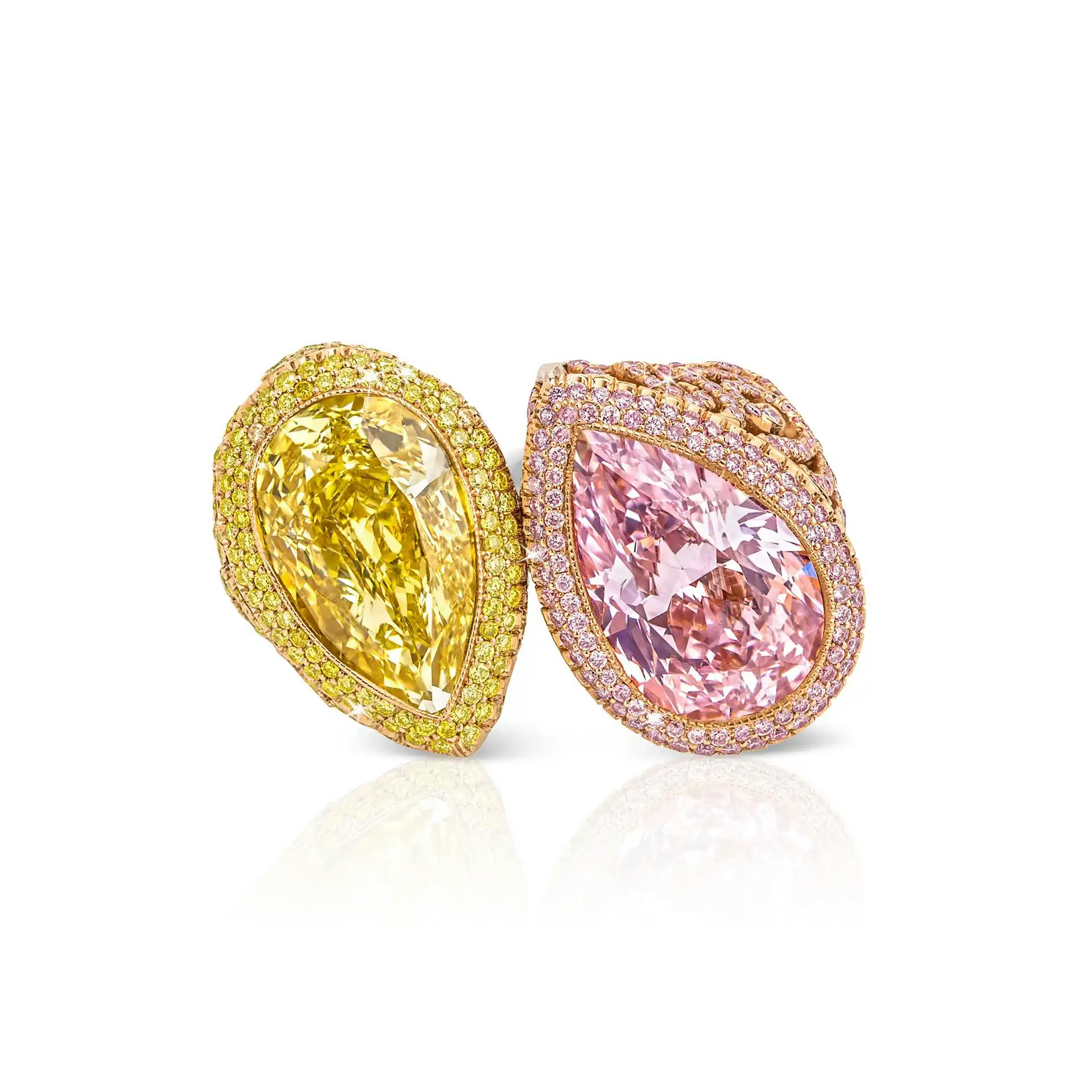 the ring is laid on a surface,  stones facing towards the viewer
