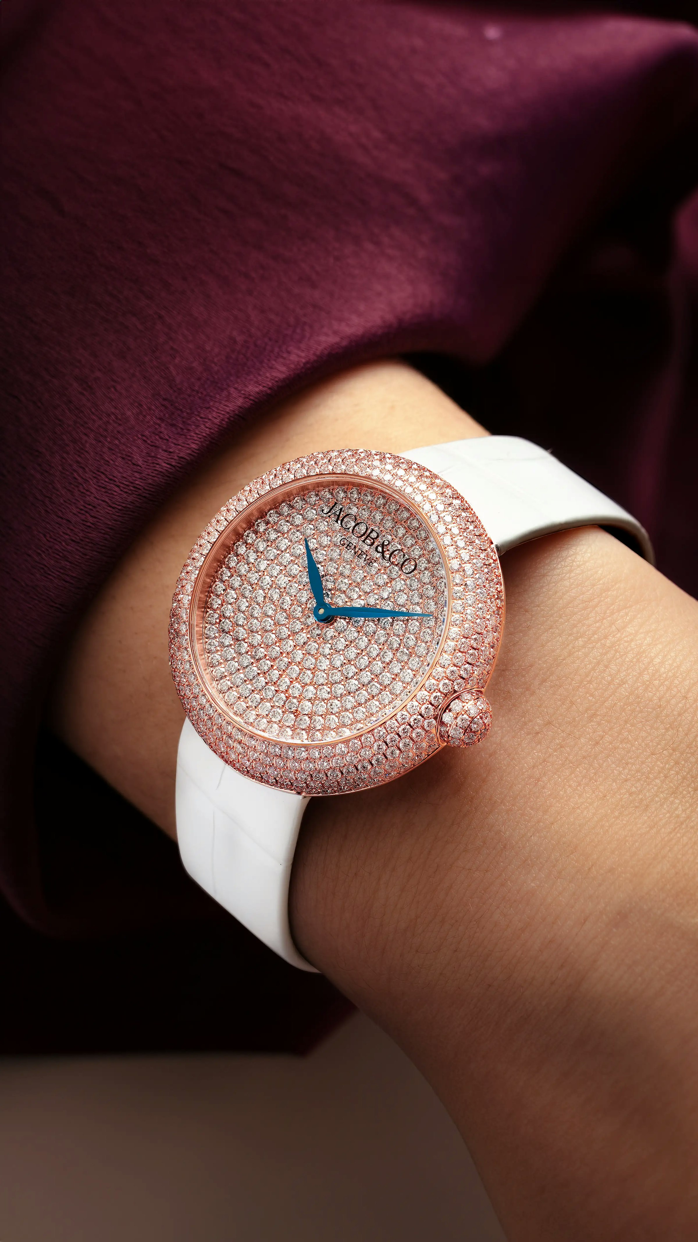 The rose gold Brilliant Pavé watch, worn on the left wrist.