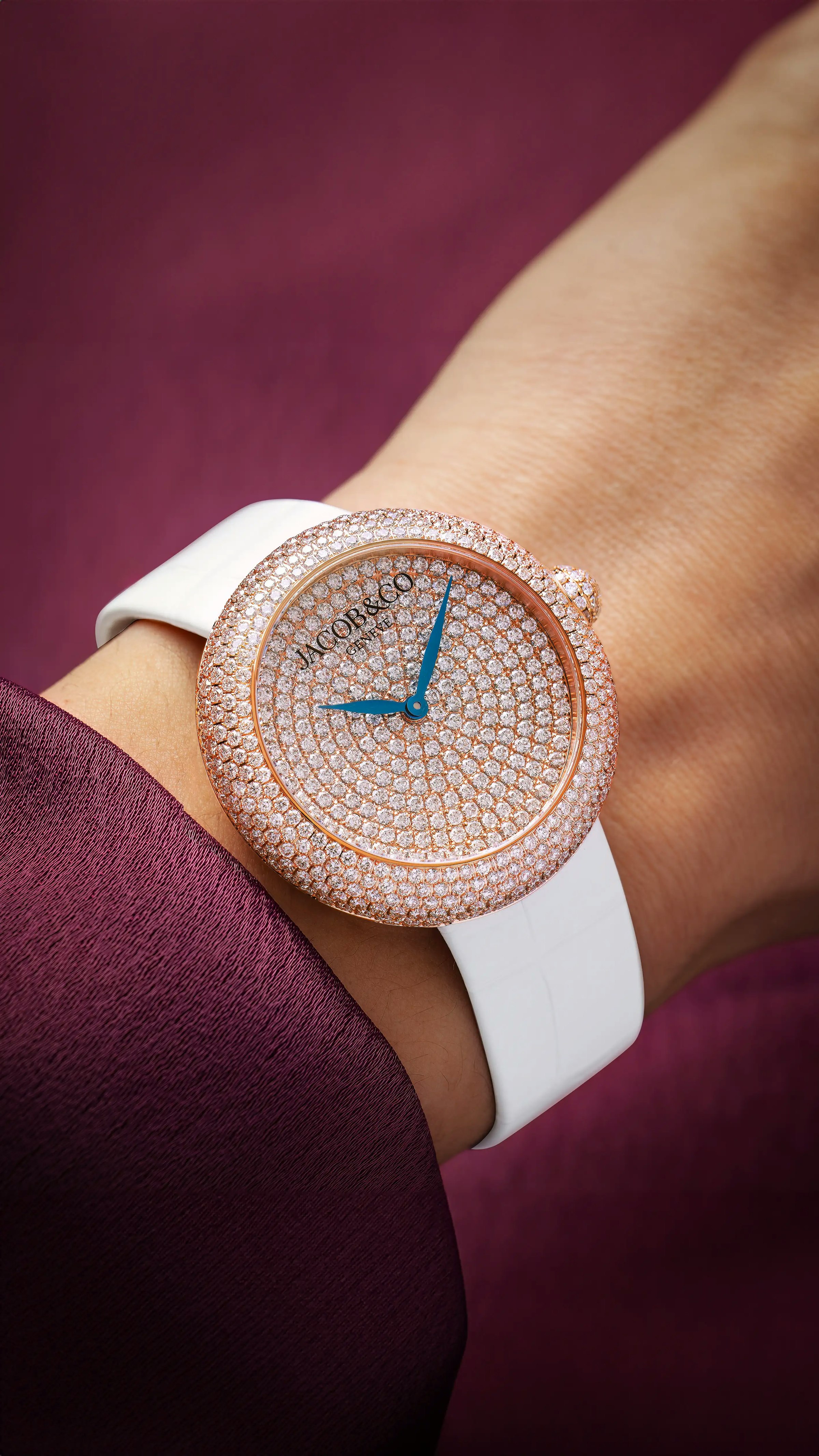 The rose gold Brilliant Pavé watch, worn on the left wrist.