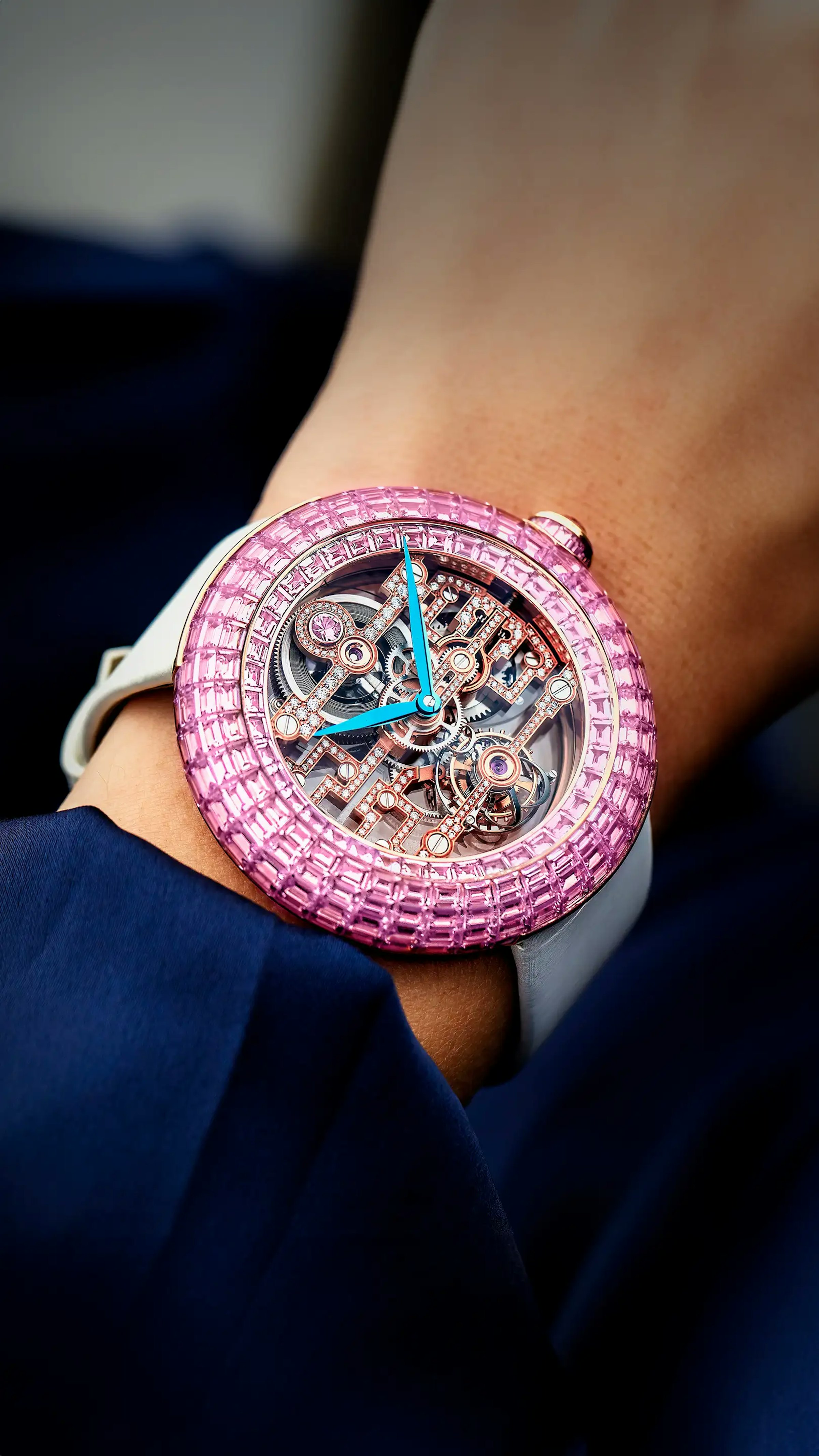 The Pink Sapphire Brilliant Art Deco Tourbillon in rose gold, worn on the left wrist.