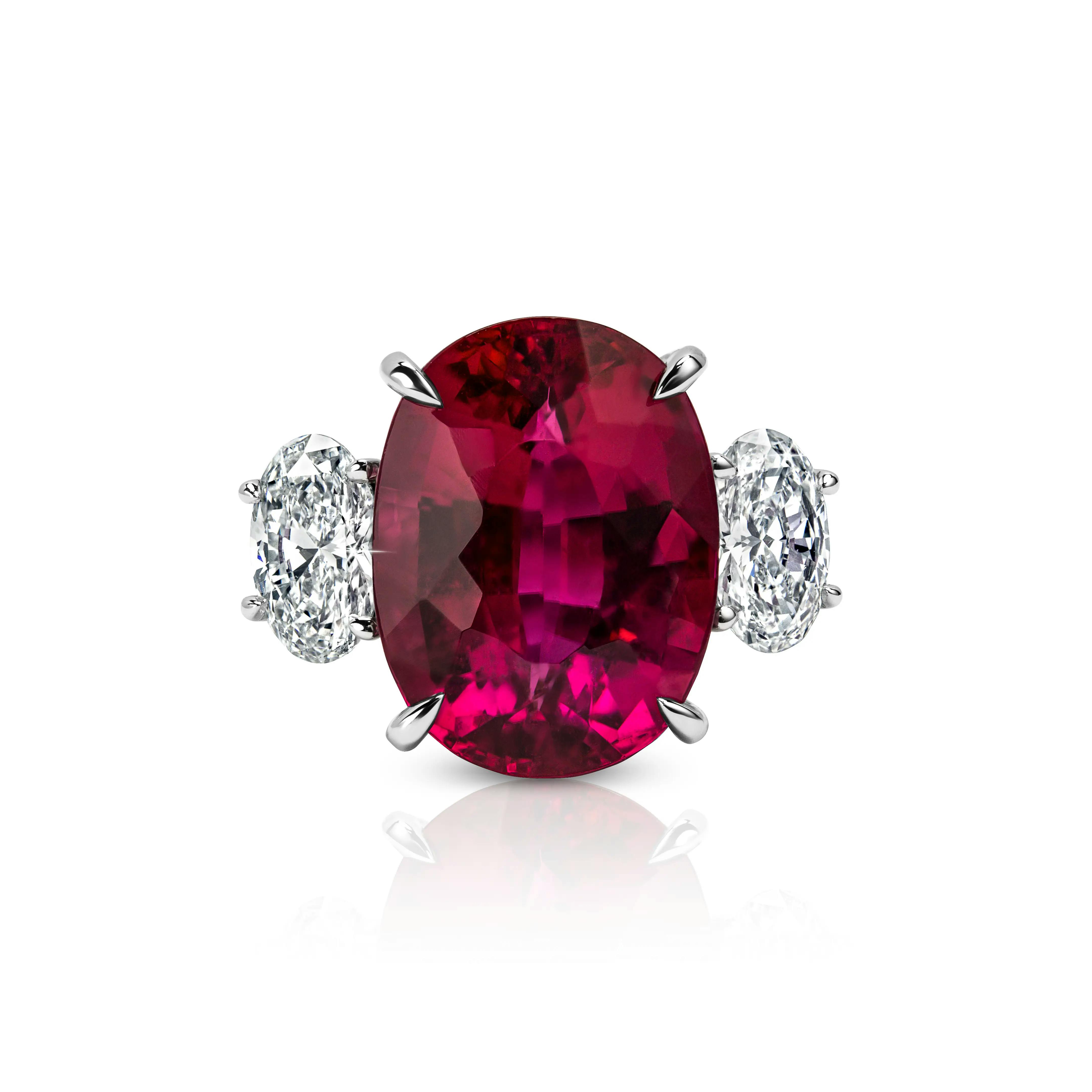 the ring is laid on a surface, facing towards the viewer