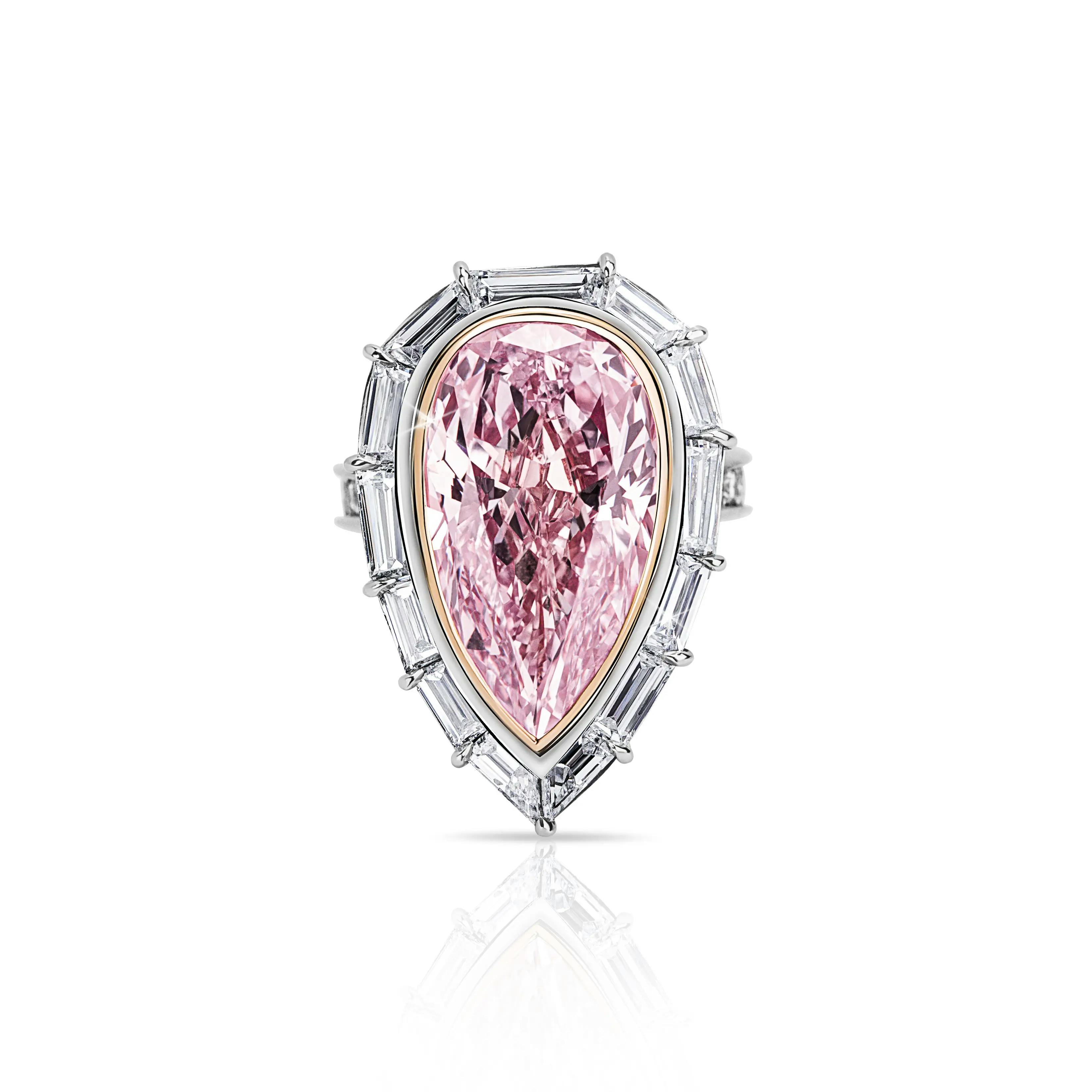 the ring, laid flat on a surface, its pointy end positioned downwards