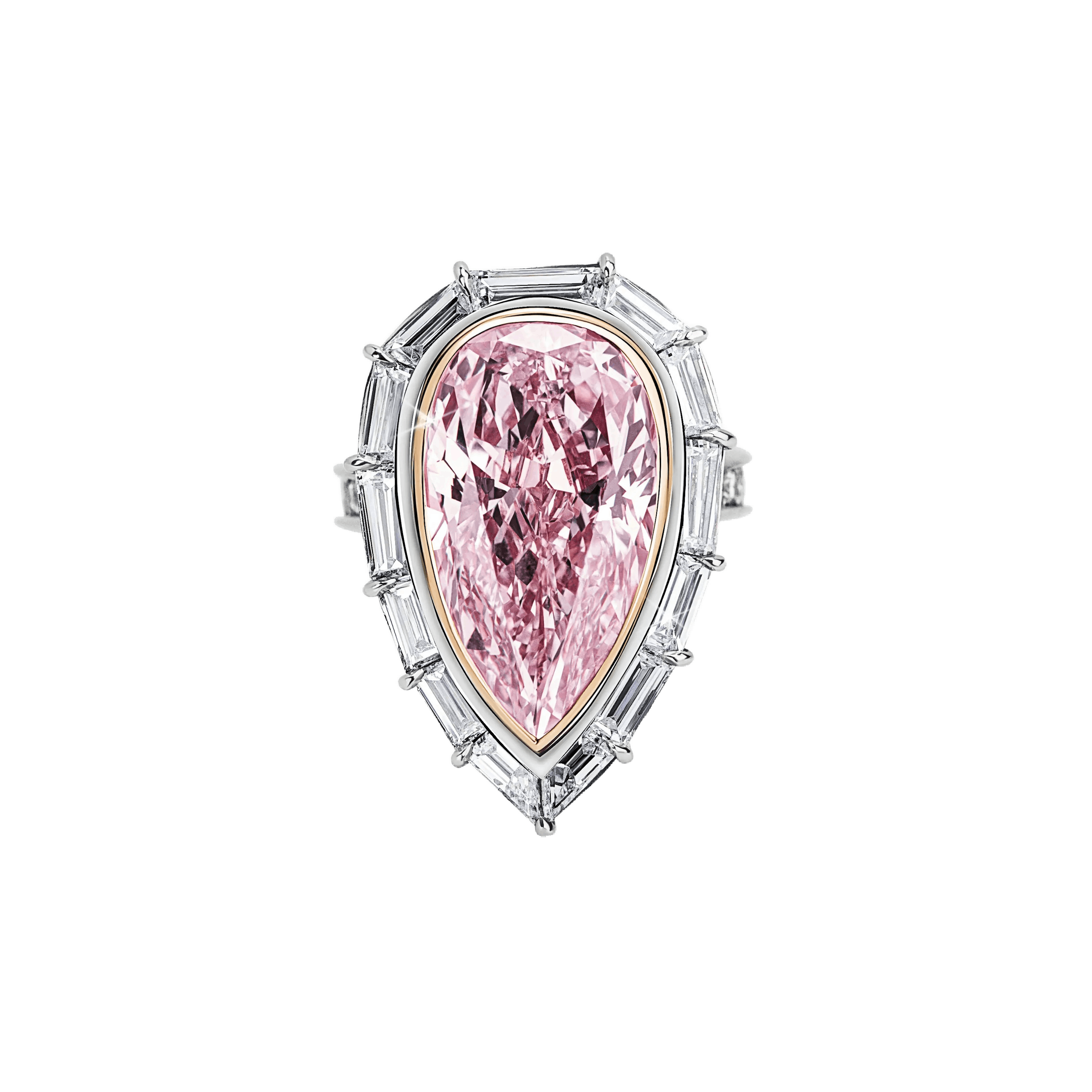 the ring, laid flat on a surface, its pointy end positioned downwards