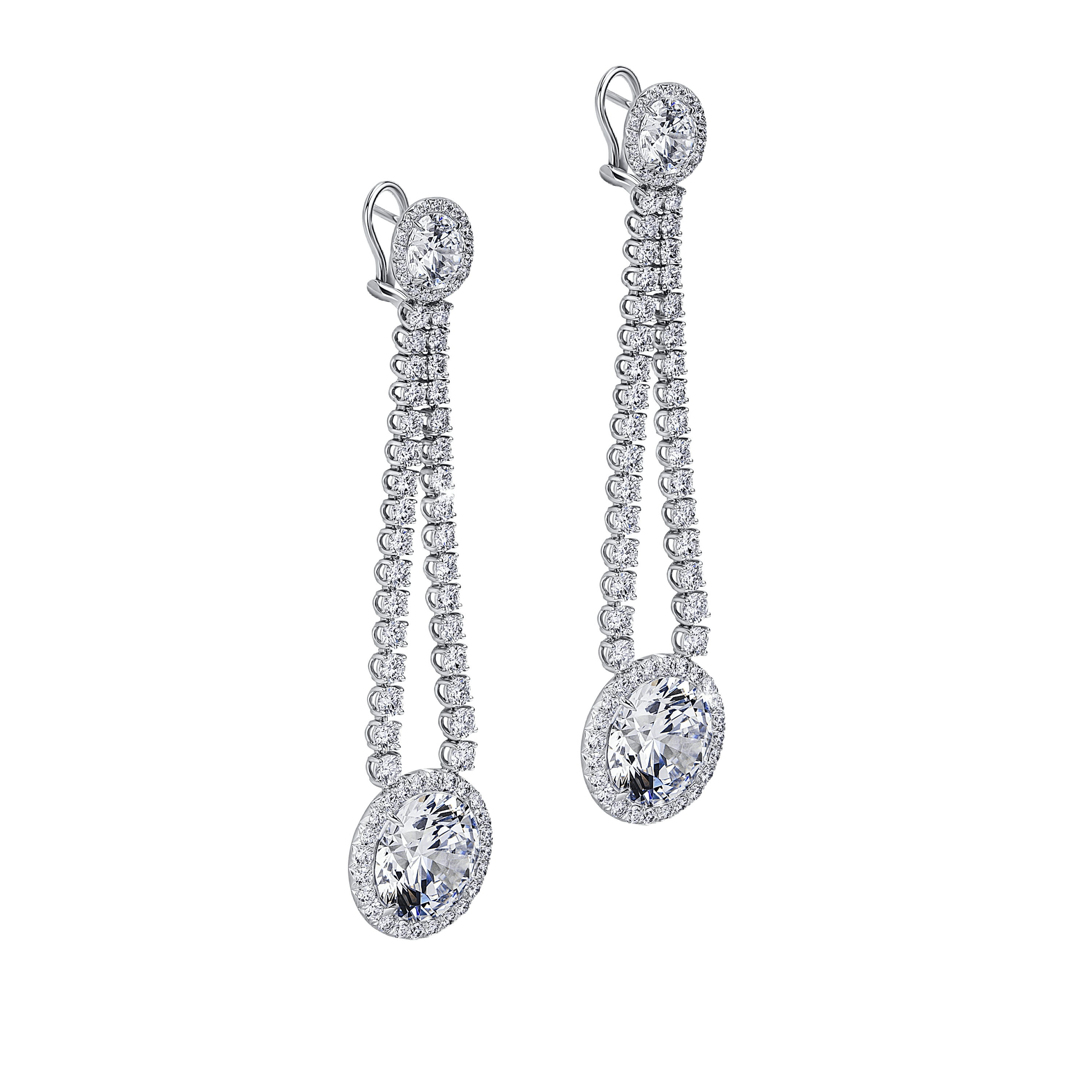 the earrings, suspended upright, tilted to the right.