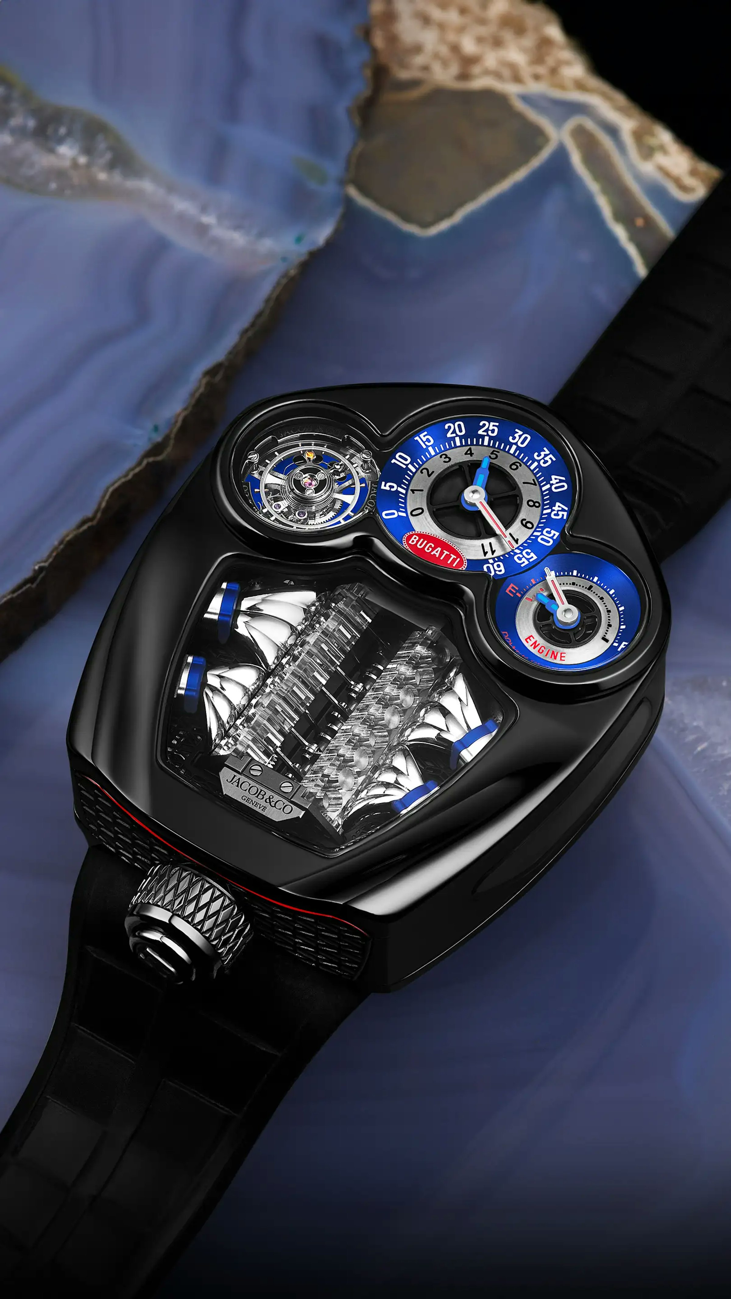 The Black Titanium Bugatti Tourbillon is laid on a surface.