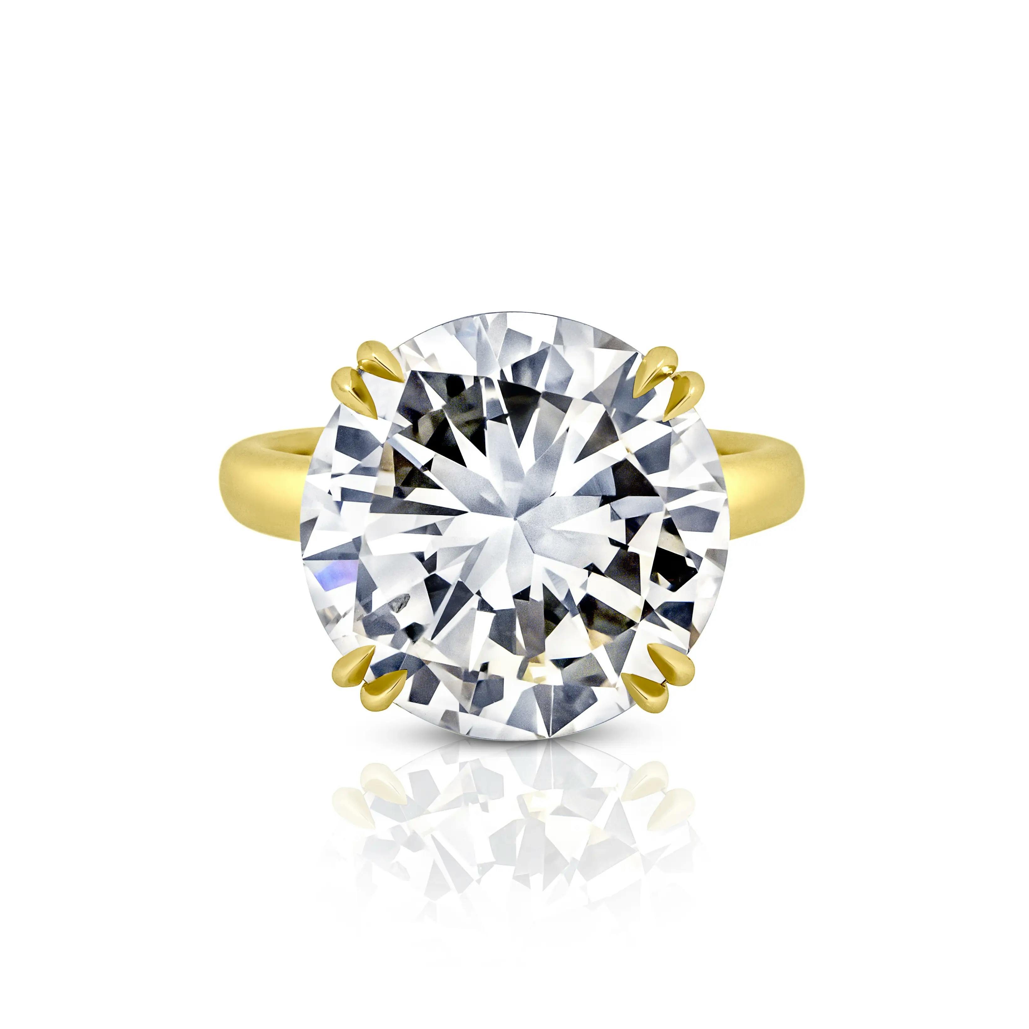 the ring, laid flat, stone facing the viewer