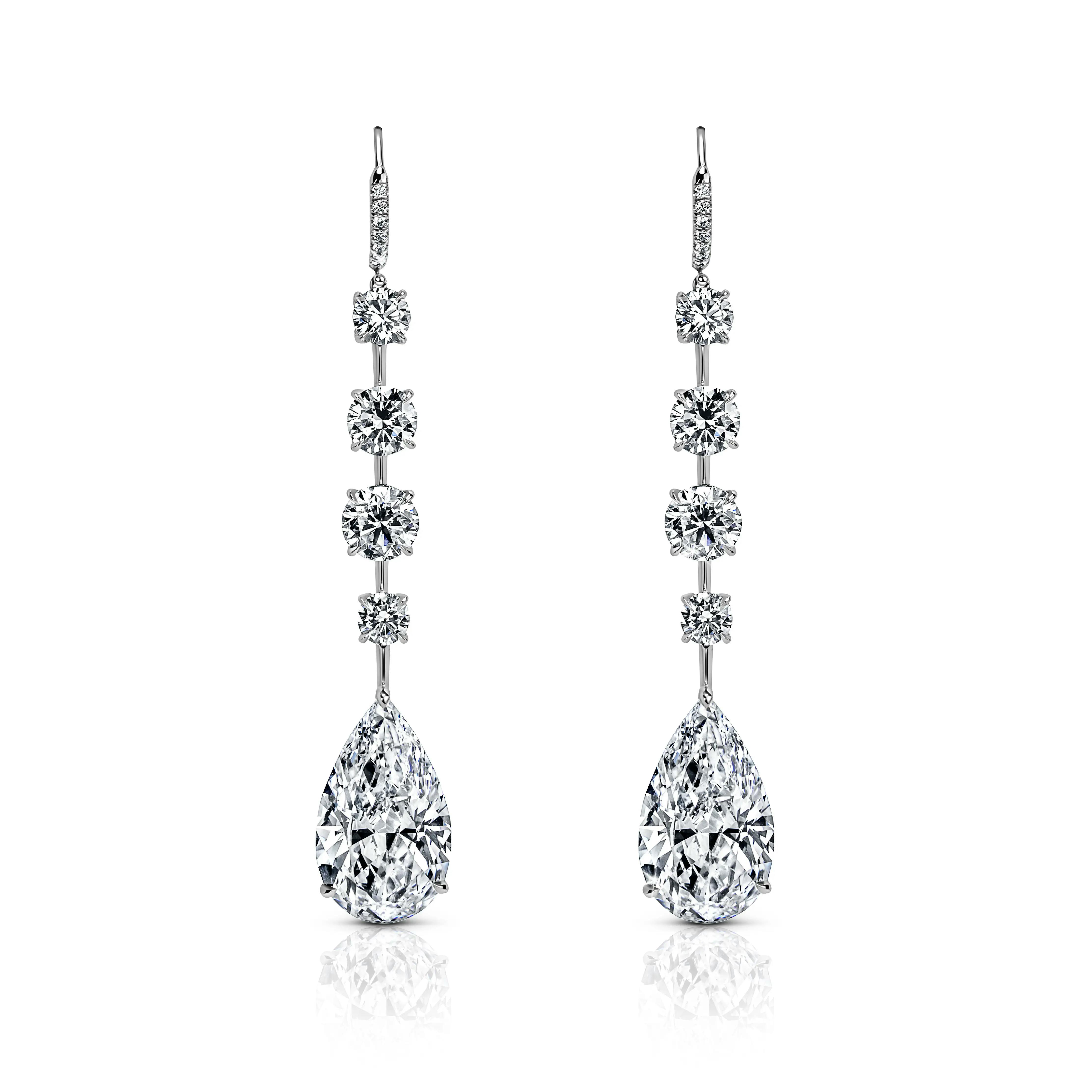 white diamond teardrop earrings.