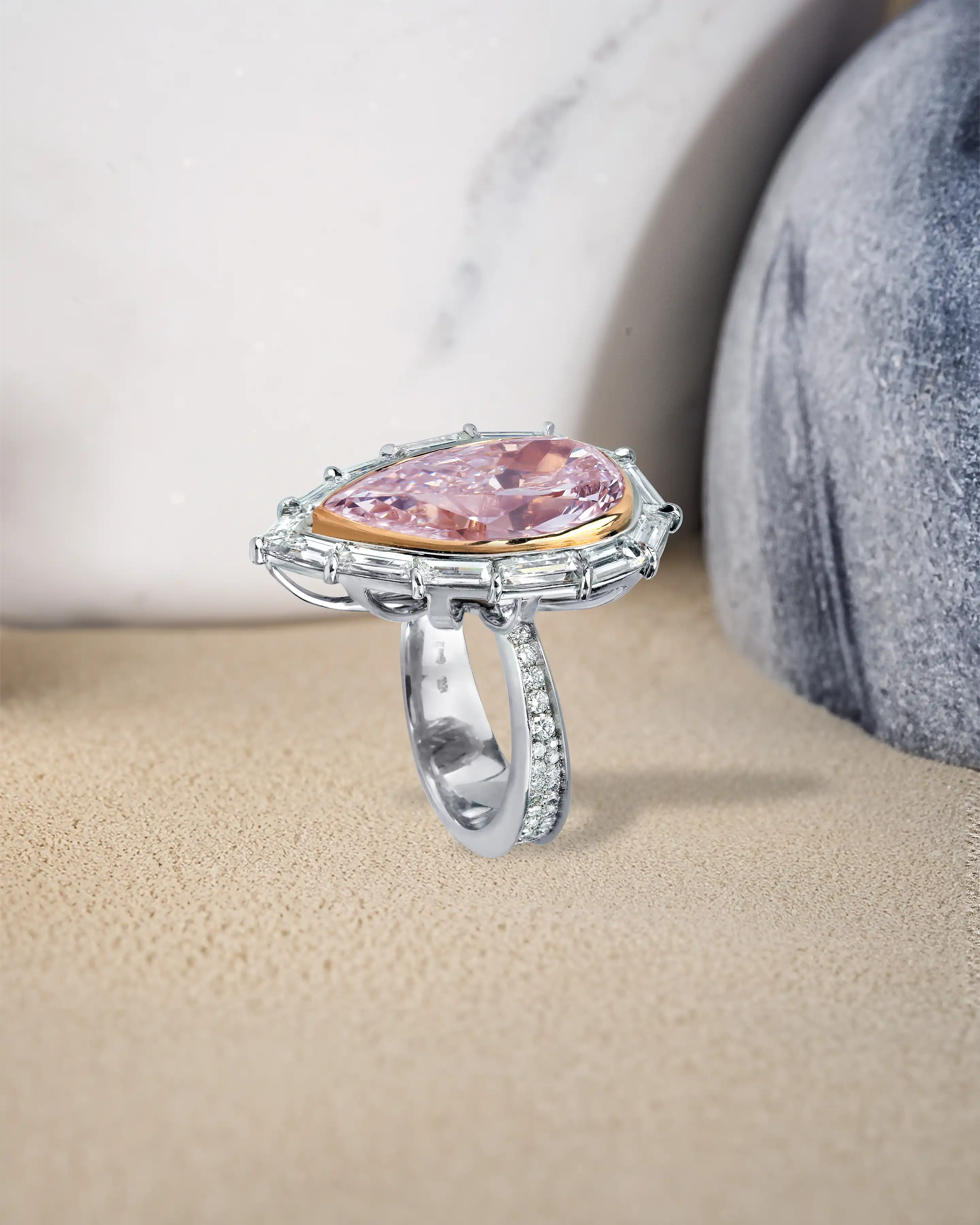 the ring, positioned upright, tilted 3/4 of the way