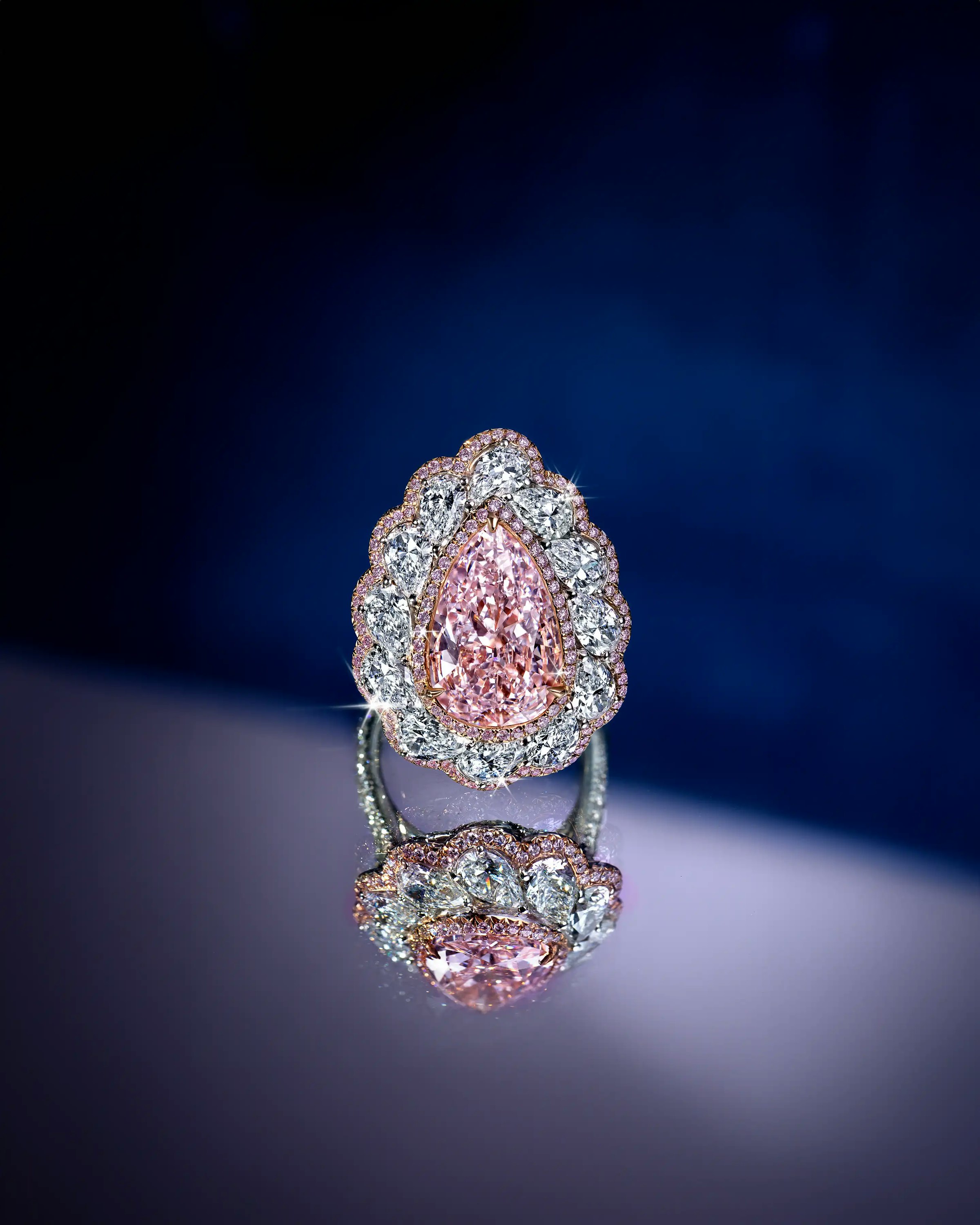 the ring, laid flat on a reflecting surface, facing forward