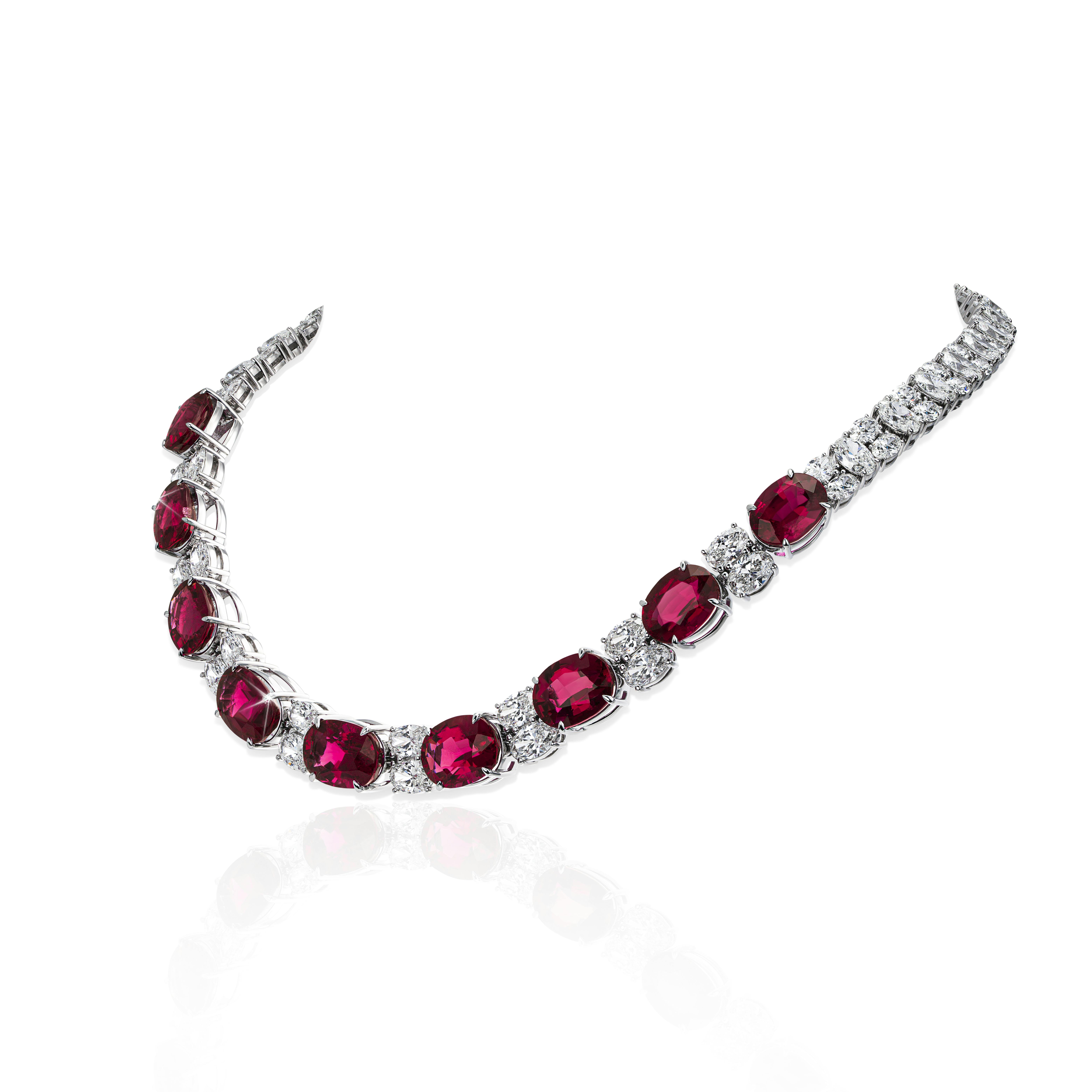 the necklace, suspended in the air, tilted to the lefthand side.