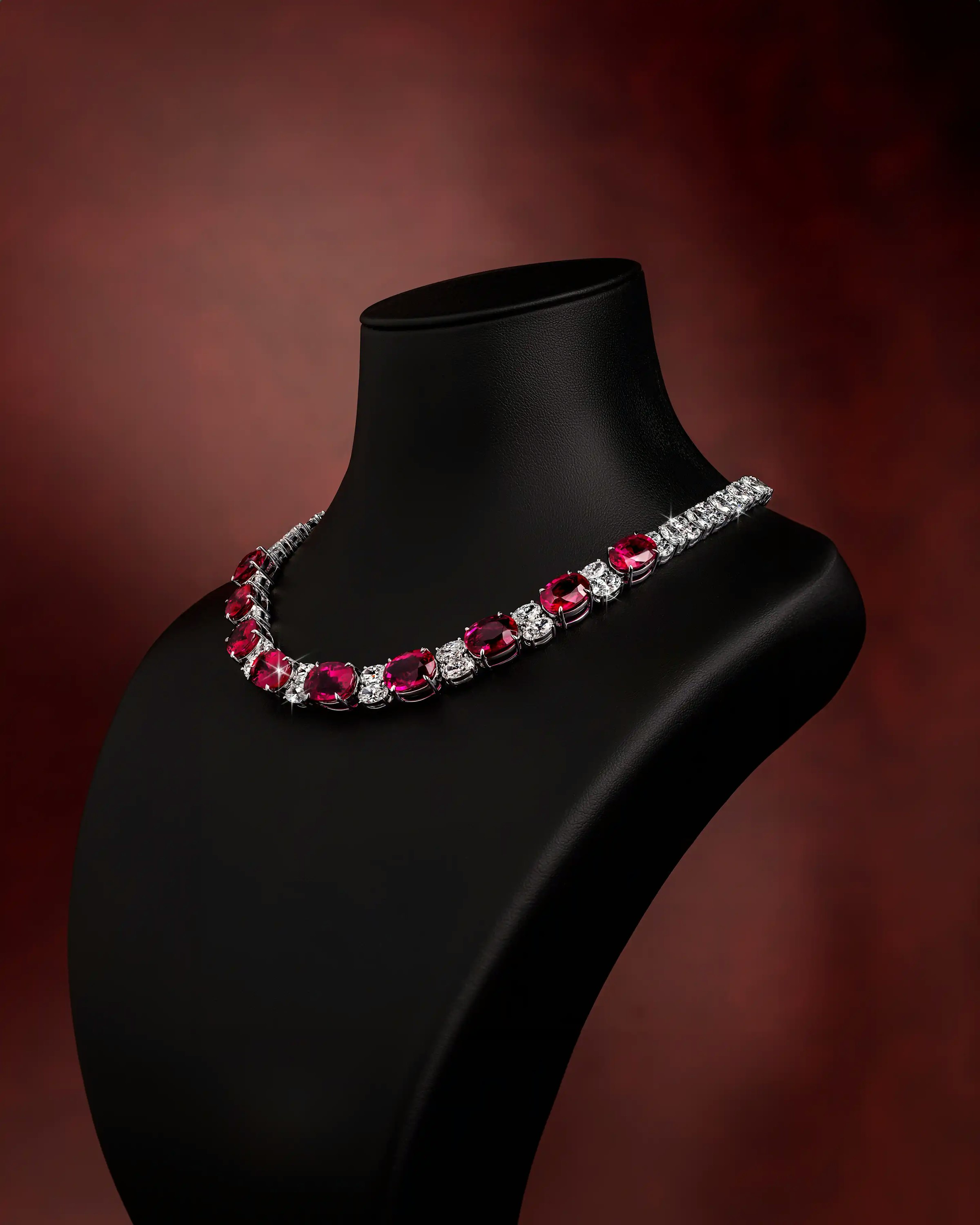 the necklace, worn on a necklace display, tilted to the lefthand side