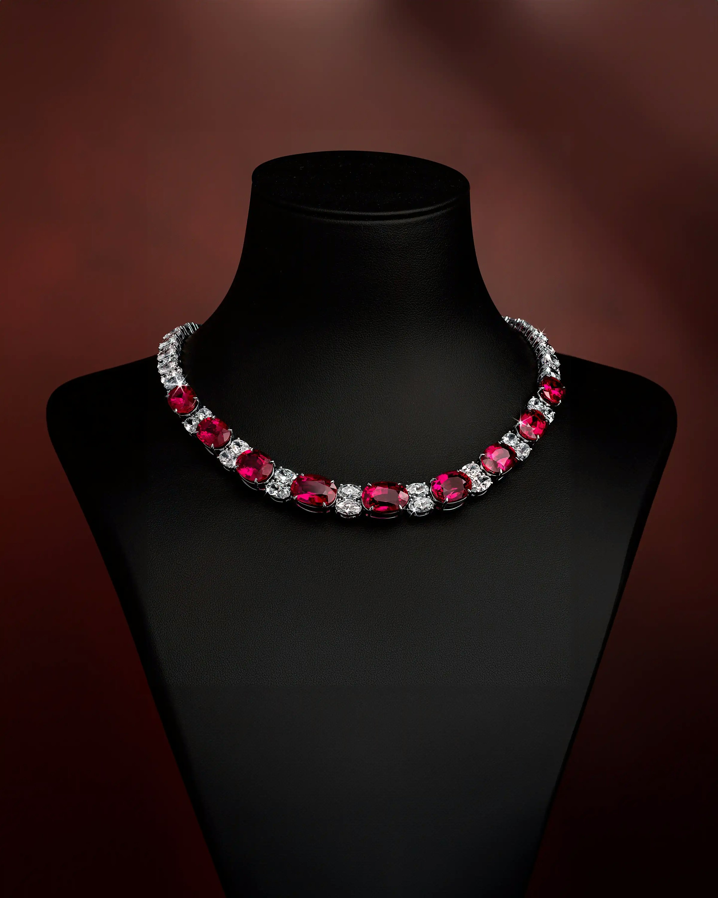the necklace, worn on a necklace display, facing the viewer