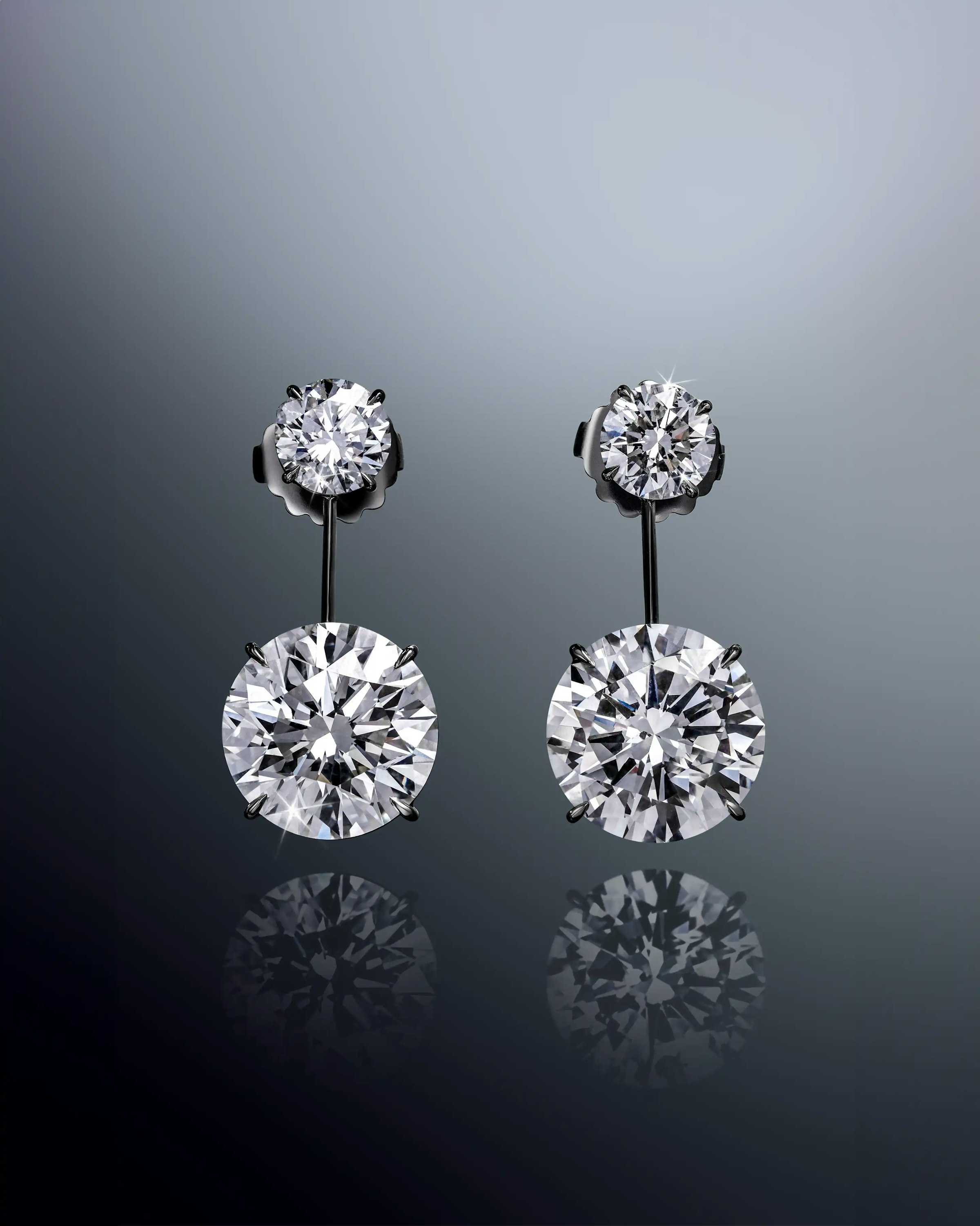 the earrings, facing the viewer
